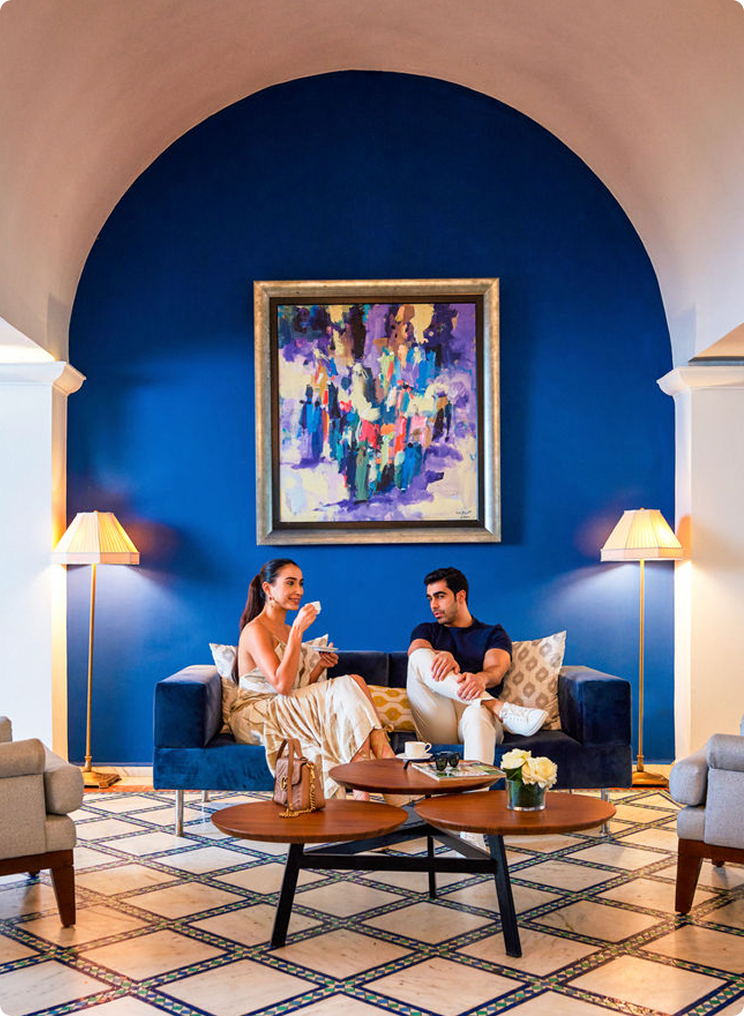 Guests having a drink in hotel lobby